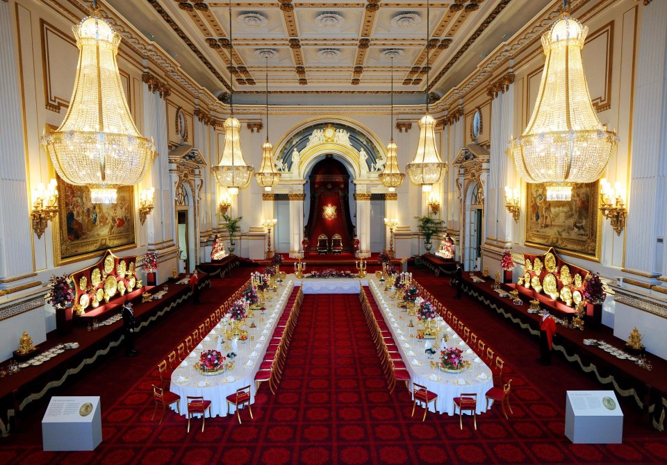 a large room with tables and chairs set up for a banquet