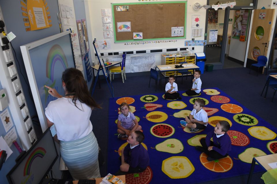  Social distancing measures have been put in place for classes at schools, with reduced class sizes seen here at Queen's Hill Primary School, Costessey, Norfolk