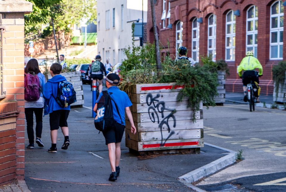  Kids headed back to school in droves today with students seen walking into Ashton Gate Primary School in Bristol