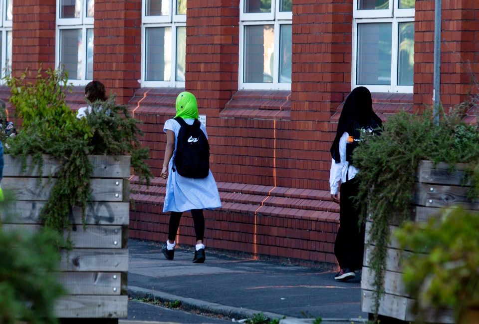  Social distance markings on playground outside primary school in Bristol