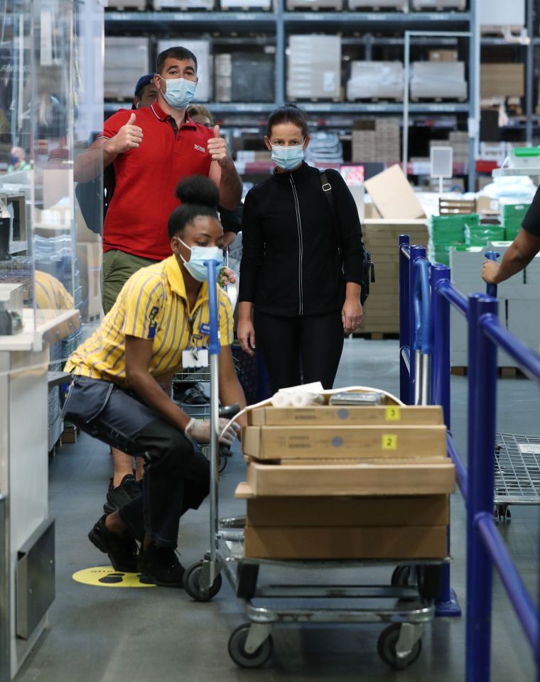 Shoppers at the till with their items in Edmonton