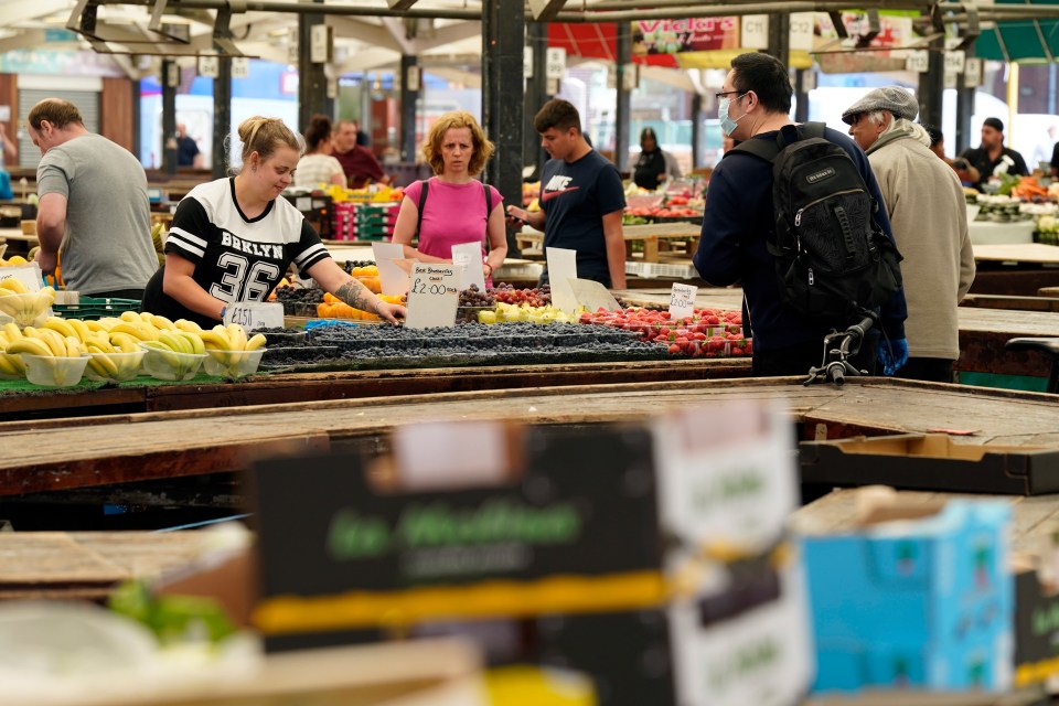 People shopping at Leicester market