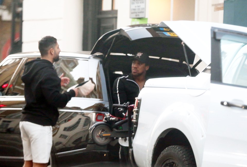  Joshua chats with a pal on his day out in central London