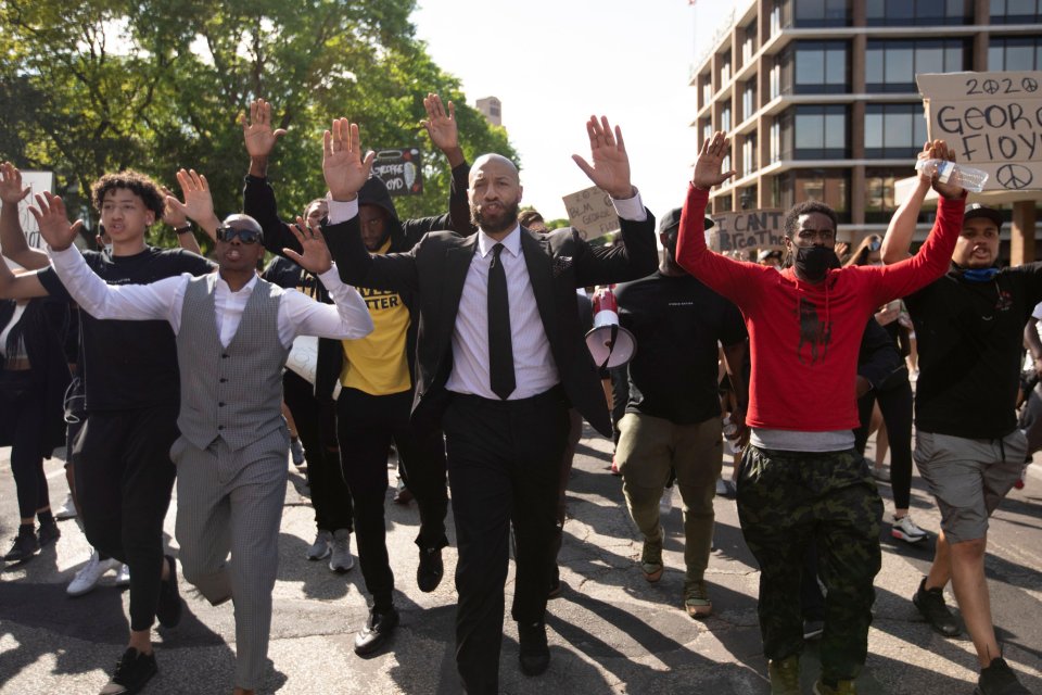  In Minneapolis, US, 'hands up, don't shoot'' was chanted as athletes led demonstrators during a protest after the killing of George Floyd by Minneapolis Police