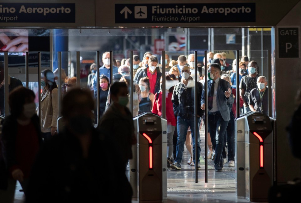  Passengers arrive at the Termini station to catch a train on Wednesday