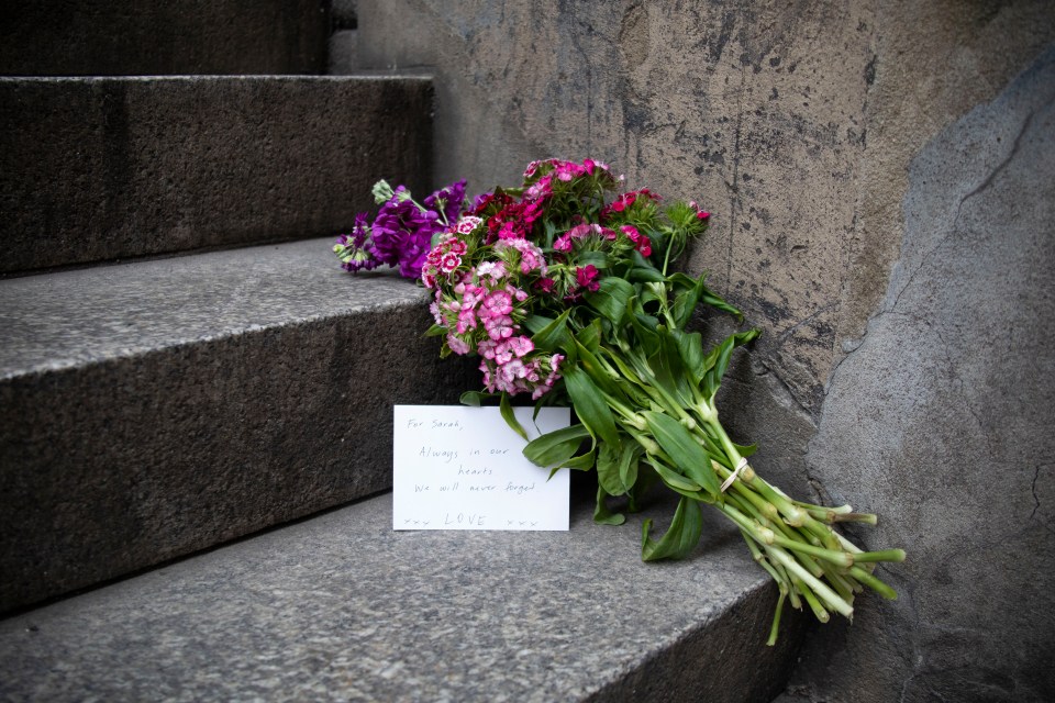  Candice Hedge, who was stabbed in the attack, left flowers at the bottom of the steps where her friend Sara Zelenak died