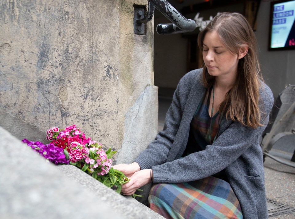  Candice Hedge, a victim of the first London Bridge terror attack lays flowers as a tribute to mark the third anniversary of the atrocity