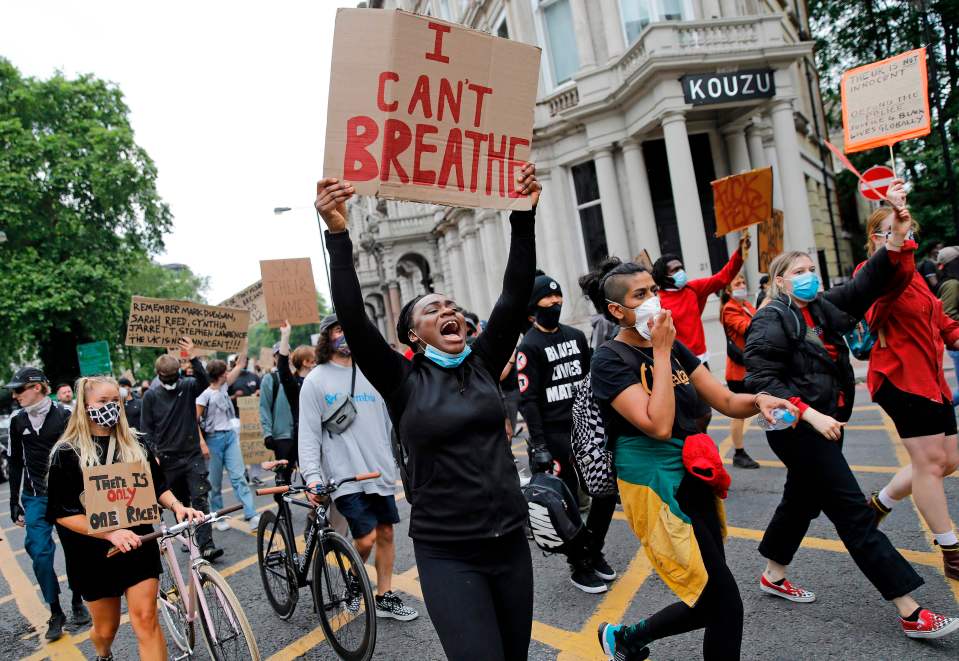 Protestors march during an anti-racism demonstration in London, on June 3