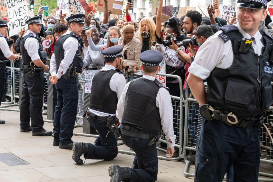 Cops policing a Black Lives Matter protest in early June 'took the knee' outside Downing Street when asked to by campaigners