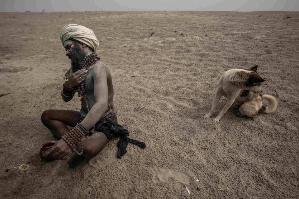  An Aghori man pictured praying in isolation