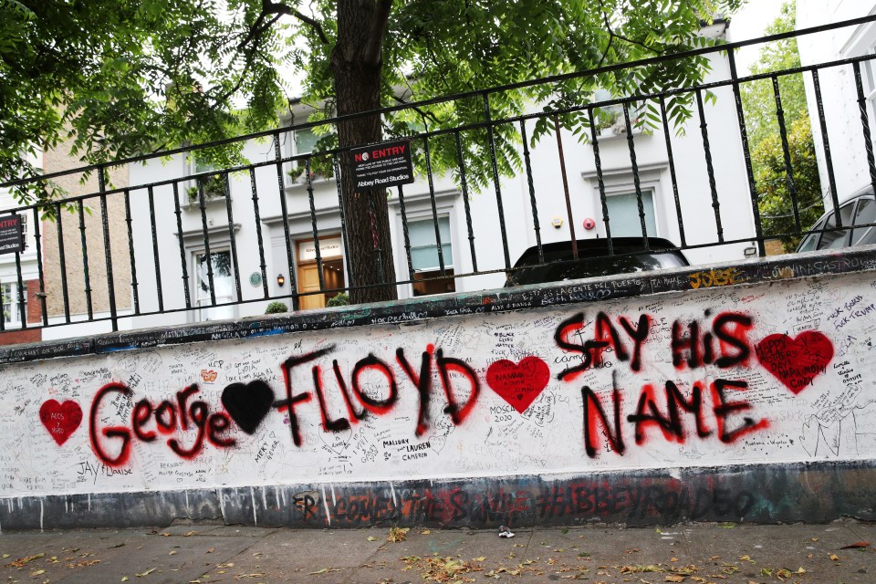 Graffiti is seen outside Abbey Road studios in London