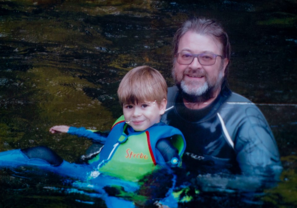 Derek and Billy pictured having a father-son motorcycle lesson 