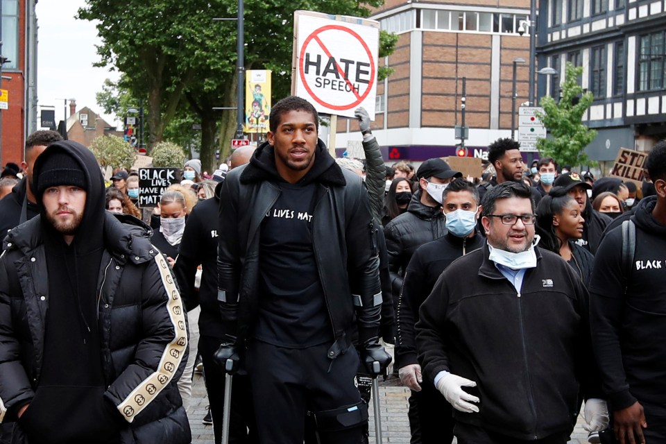  Anthony Joshua said 'we can no longer remain silent' as he joined a Black Lives Matter march in Watford