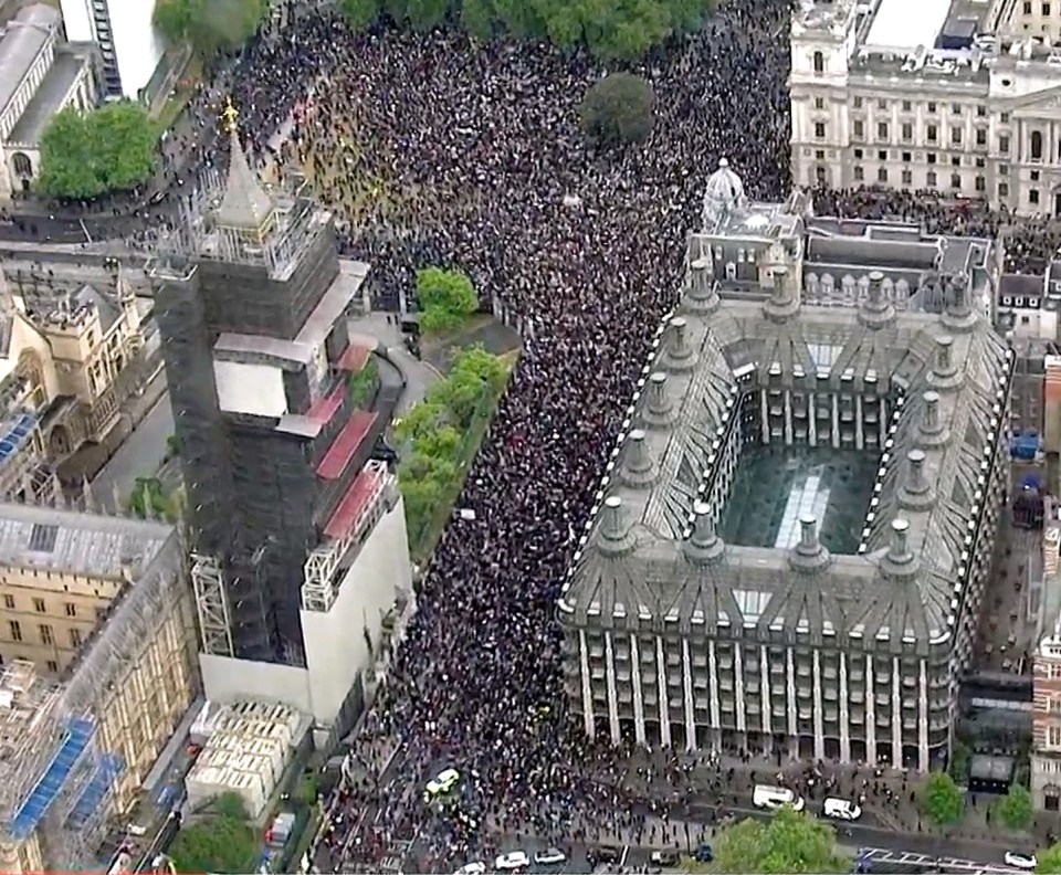 An aerial view shows thousands of protesters gathered in Parliament Square, London, yesterday