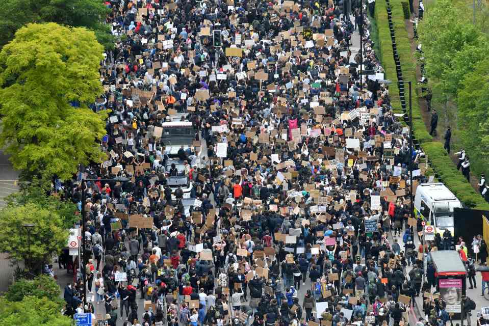 Protesters march on the US Embassy in London