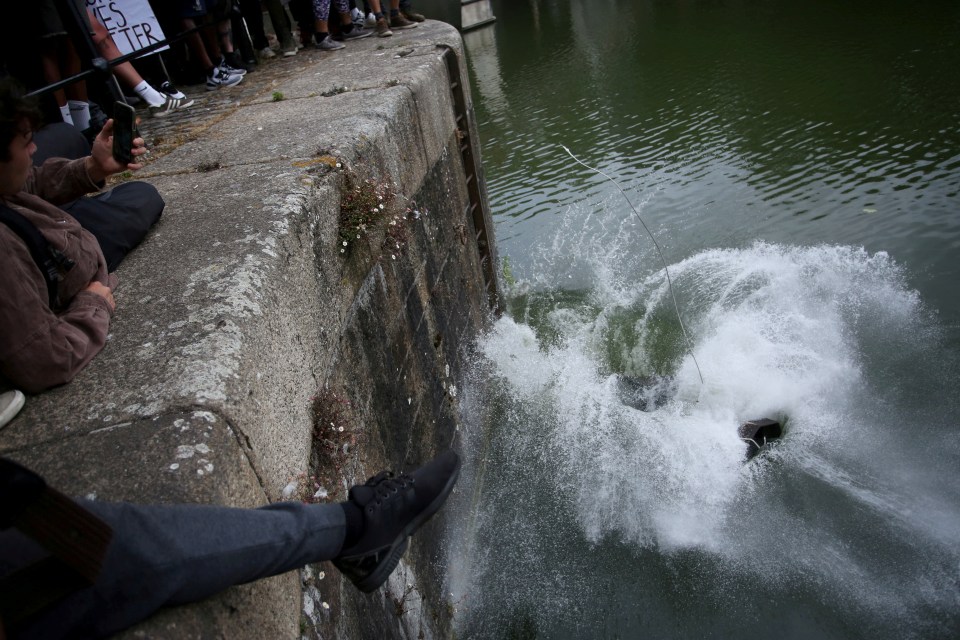  It was then rolled into the water as the jubilent crowd watched on