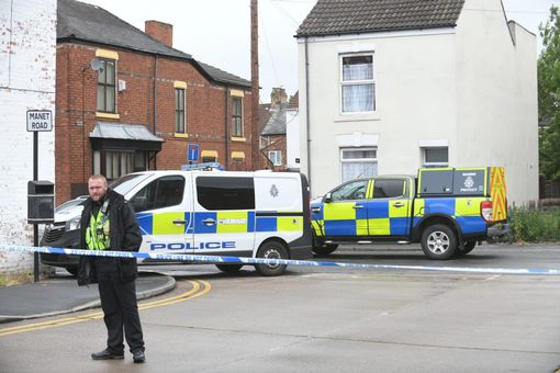  Officers swarmed Durham Street in east Hull street with residents have been told to stay indoors