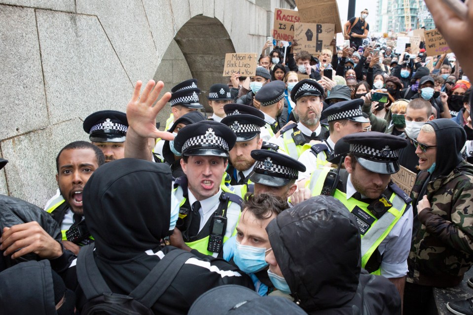 Police and protesters face off on Vauxhall Bridge on Sunday