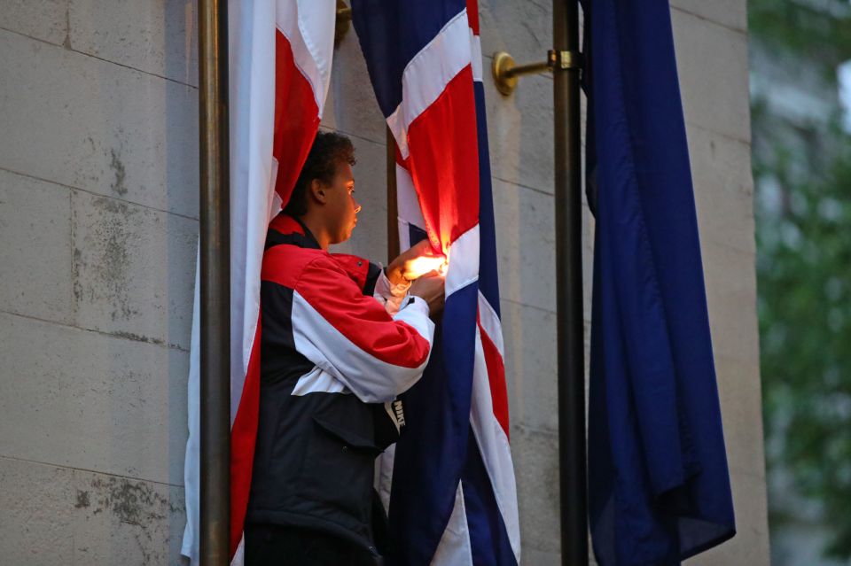  A protester tried to set fire to the UK flag in London