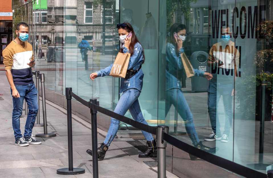  Shoppers leave a newly re-opened Zara in Dublin