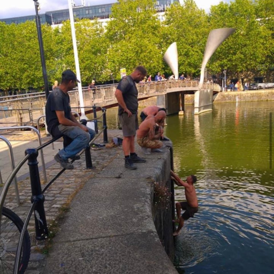 A group of men were seen trying to rescue the Colston statue on Monday