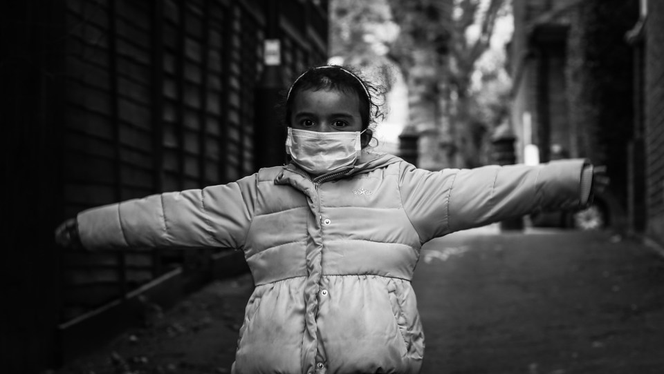 We are the Future captures a little girl wearing a face mask 