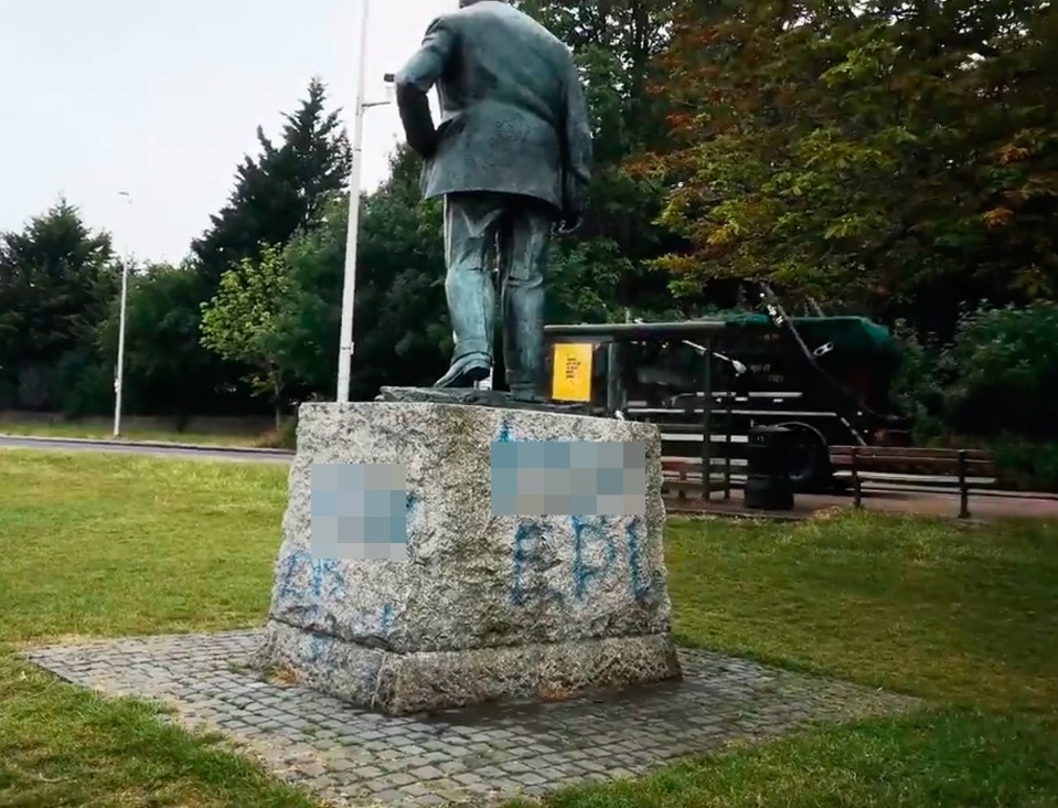 The statue had several messages sprayed onto the base