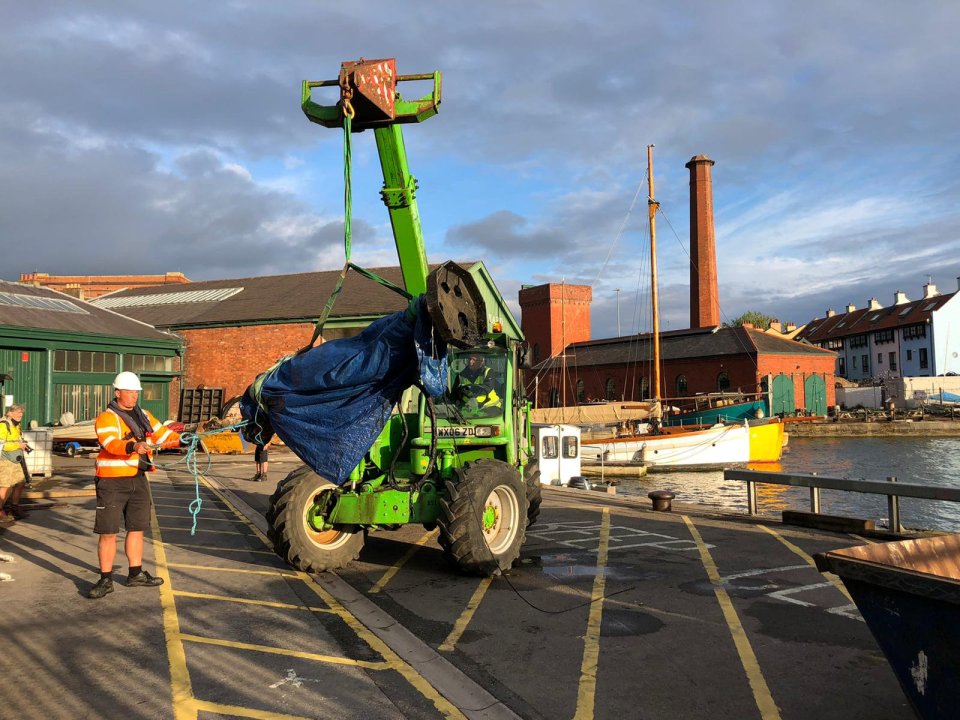 The statue will be hosed down to remove the mud