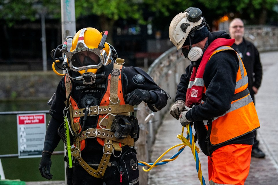 A diver had gone into the water to locate the statue