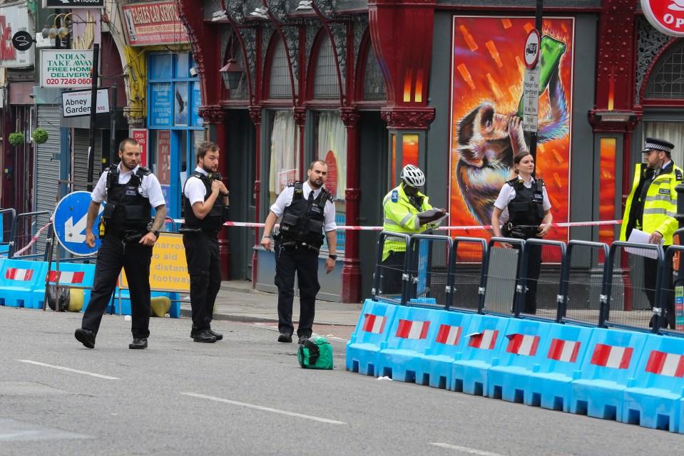  Police at the scene after the Rabbi, in his 50s, was knifed in broad daylight