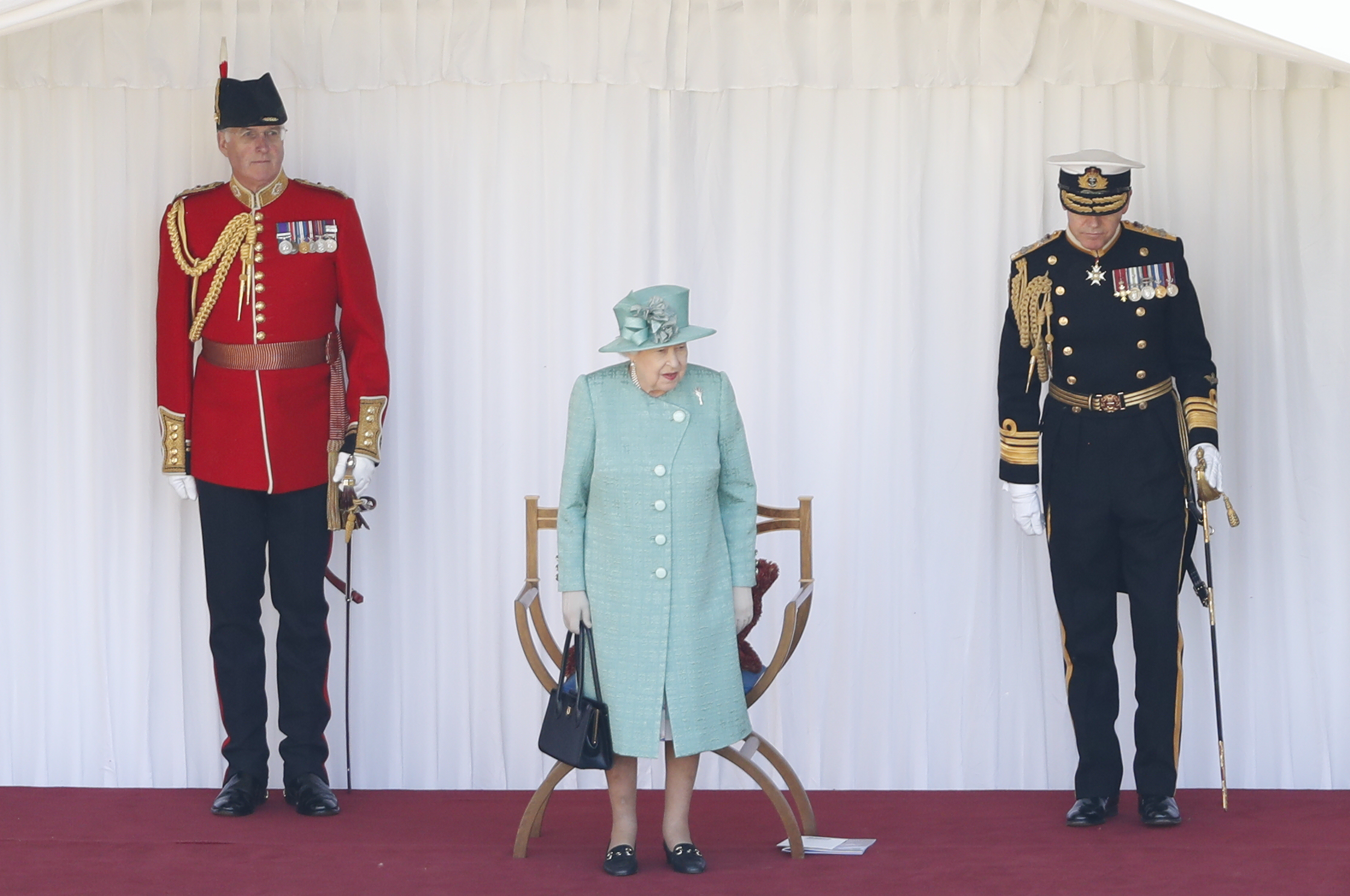 The Queen took part in a scaled-down version of Trooping the Colour