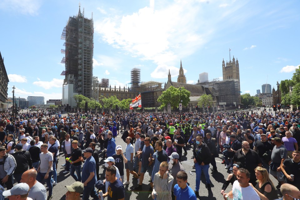 Huge crowds were pictured outside Parliament today