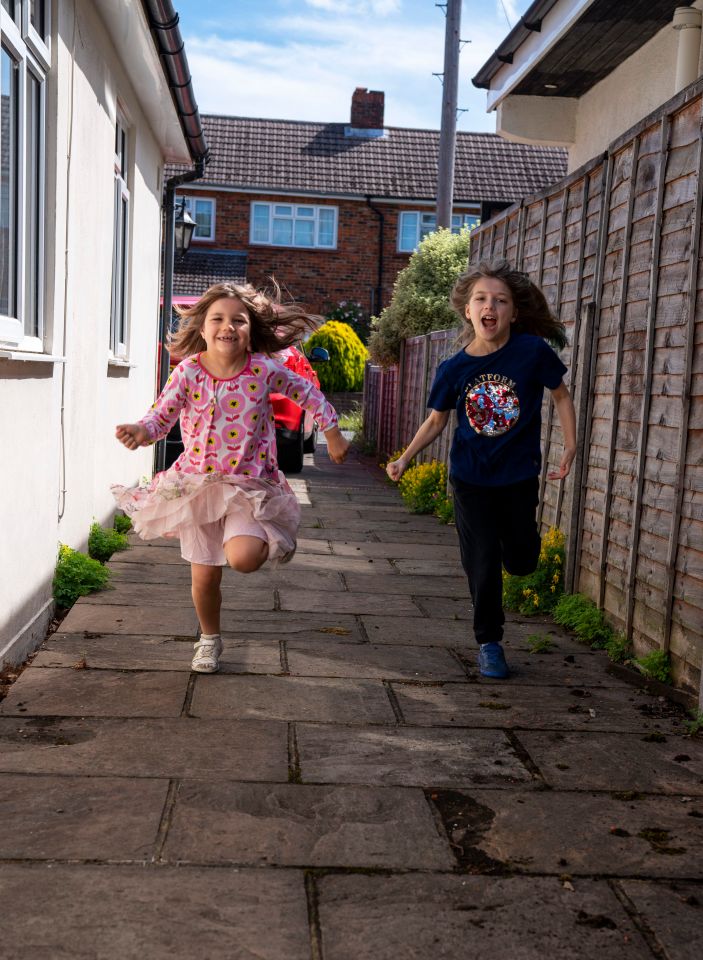  Emily (right) and Daisy running to see their grandma