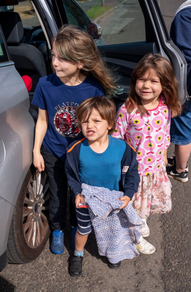  Emily Benjamin and Daisy waiting to see their Grandma in Ashtead