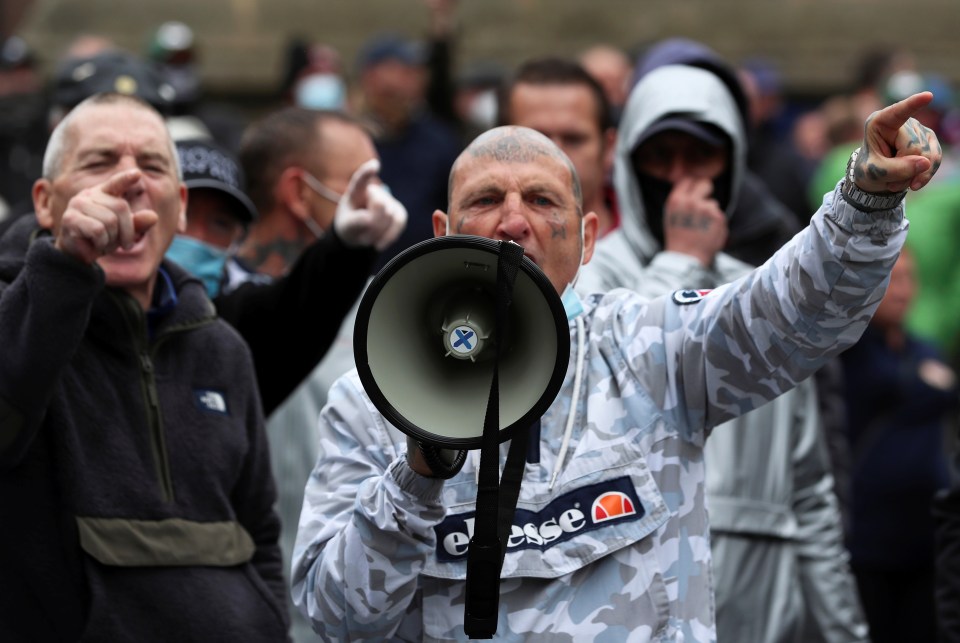 A counter-protester shouts into a megaphone during a Black Lives Matter protest in Newcastle 