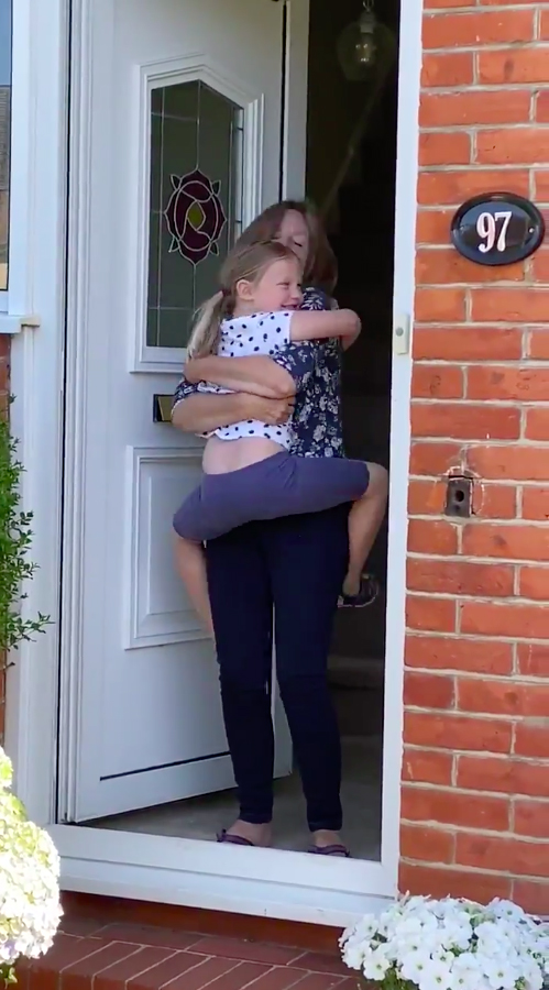  Heidi hugs her grandmother for the first time in three months