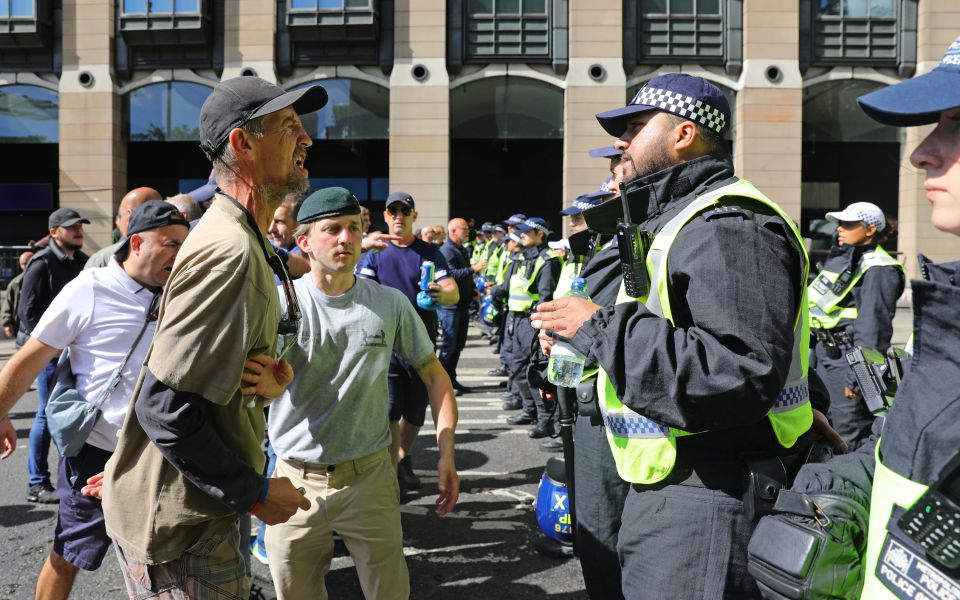 Police blocked the protesters from moving forwards in Westminster amid violence