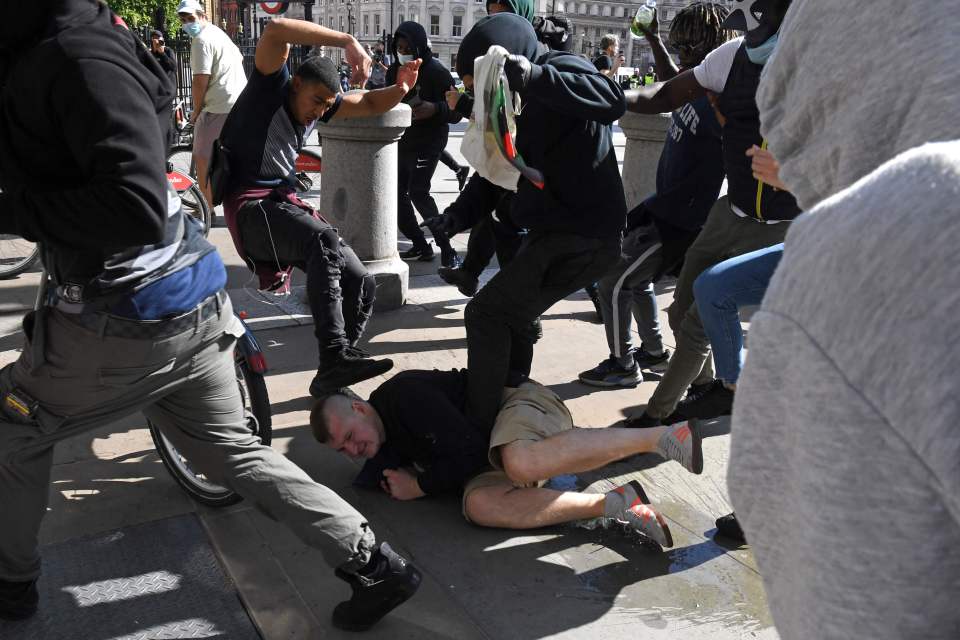 The groups clashed at Trafalgar Square yesterday afternoon