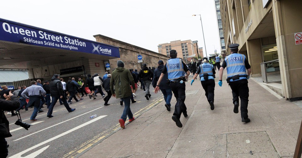  Cops had to separate clashes between rival protesters in the Scottish city