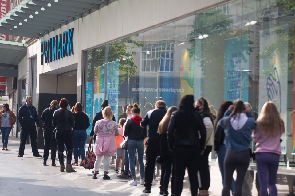 Shoppers outside a Primark store in Liverpool