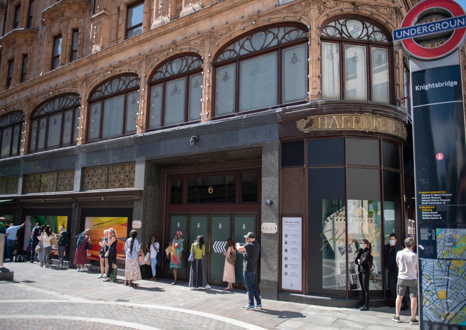 Shoppers queuing outside the store after it was allowed to reopen in May