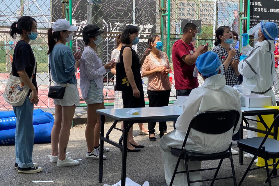 Residents line up at a coronavirus testing centre