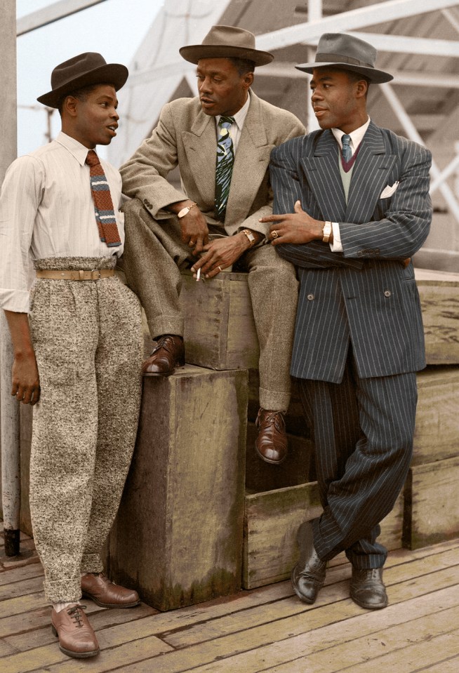 Three gentlemen aboard the ‘Empire Windrush’ in Essex, June 1948