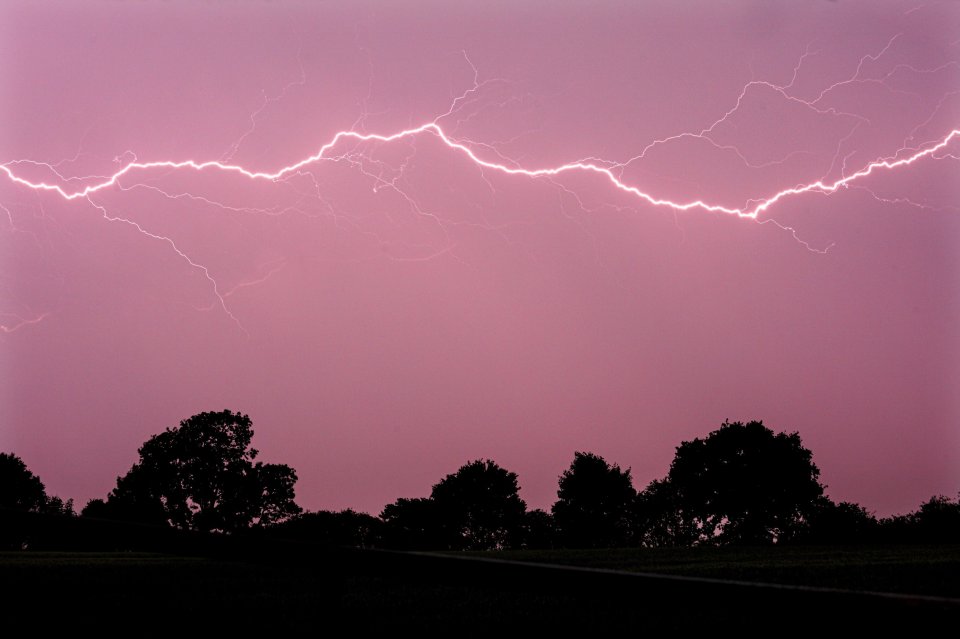  Lightning pictured across fields along Aldridge Rd in Walsall