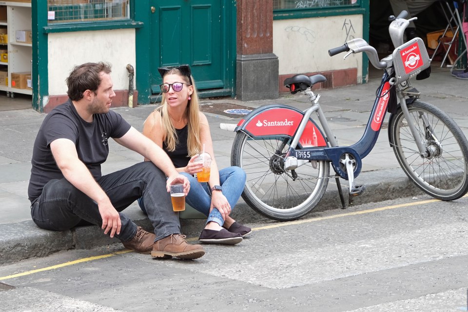 At the moment people are spilling out into the streets as the pubs are only serving take-away pints