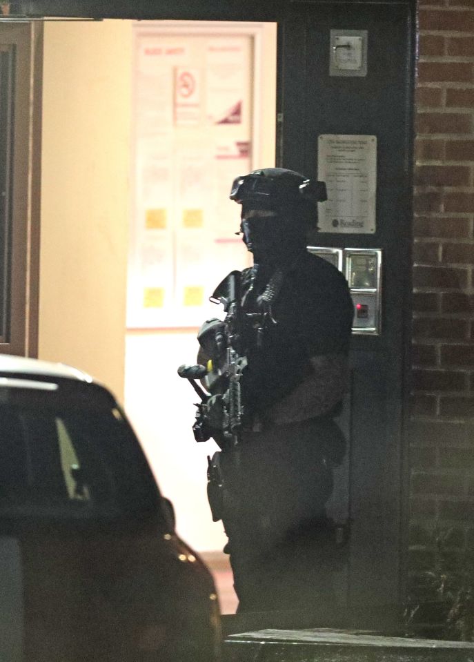 Armed police could be seen keeping watch in the area