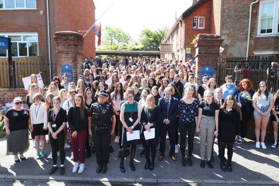 Students and staff at the school of one of the victims came out to pay their respects