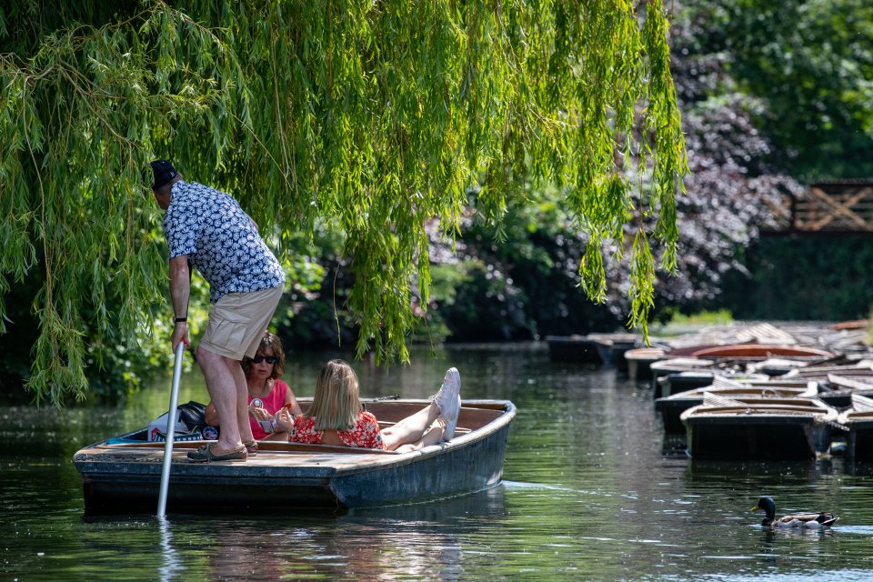 People taking advantage of the warm weather on the river Cam in Cambridge