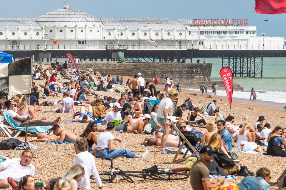 Crowds flocked to the beach in Brighton to enjoy the weather 