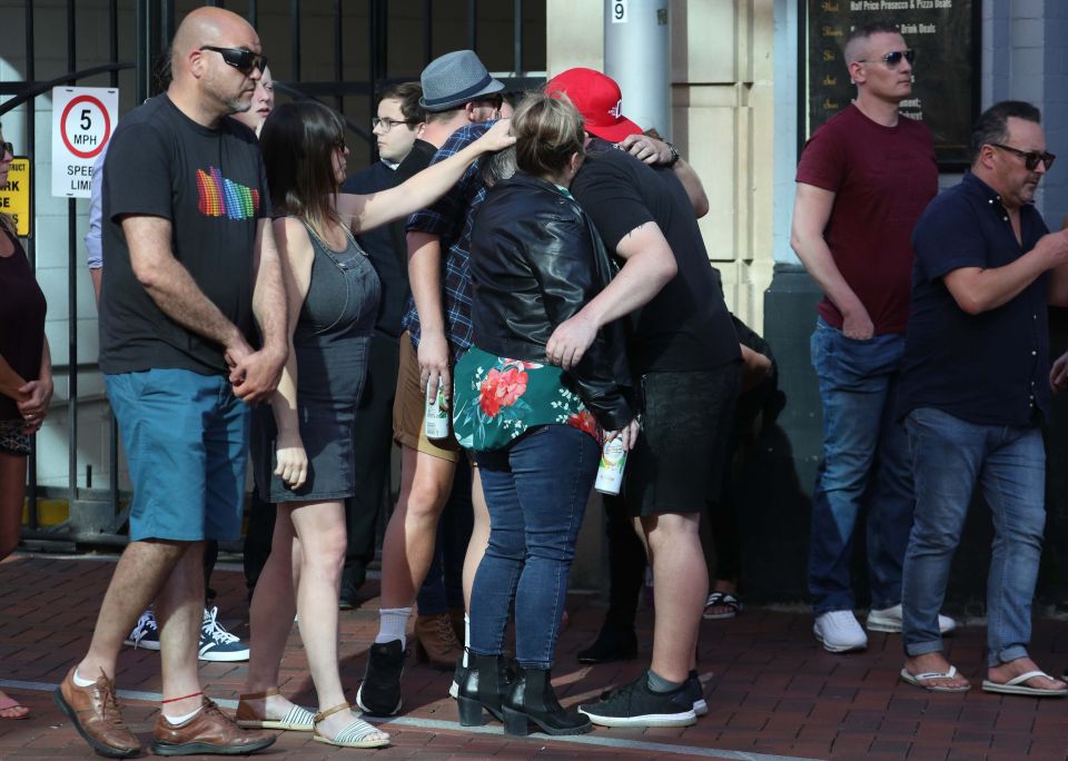  Mourners gather outside The Blagrave Arms near Forbury Gardens, in Reading town centre